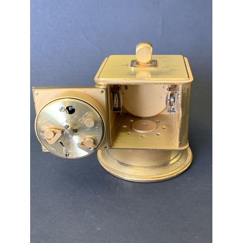 141 - A vintage 'looping' four face alarm clock and weather station, includes thermometer, barometer and h... 