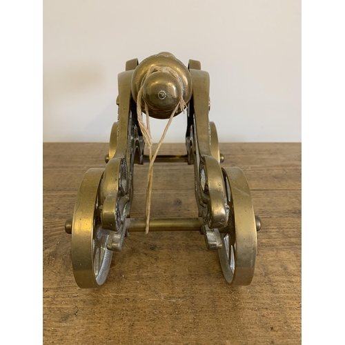 150 - A heavy brass cannon, approx. 15