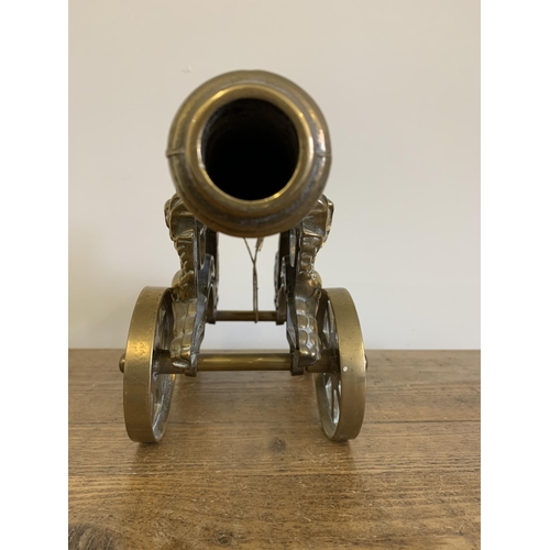 150 - A heavy brass cannon, approx. 15