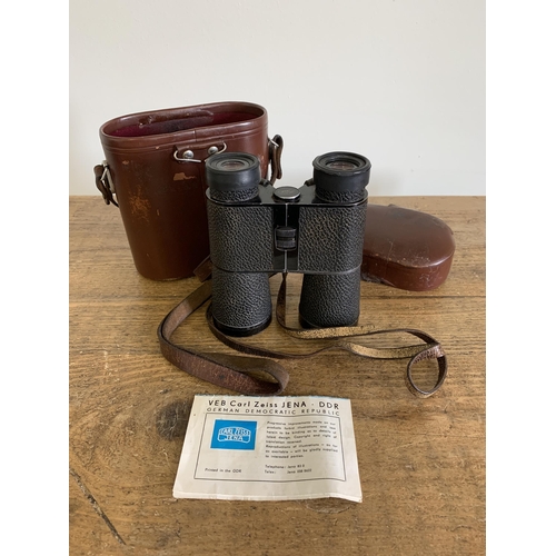 165 - A vintage cased pair of Carl Zeiss Jena Trinovid 8x32b with very good optics (case as found)