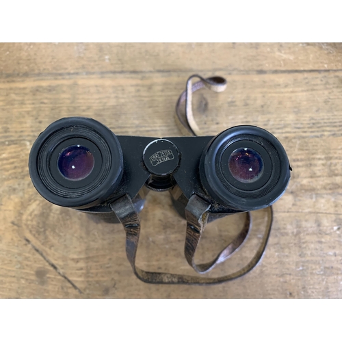 165 - A vintage cased pair of Carl Zeiss Jena Trinovid 8x32b with very good optics (case as found)