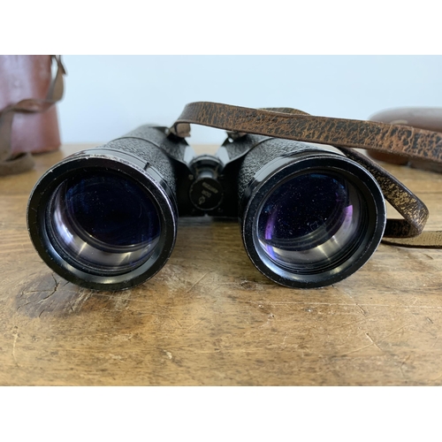 165 - A vintage cased pair of Carl Zeiss Jena Trinovid 8x32b with very good optics (case as found)