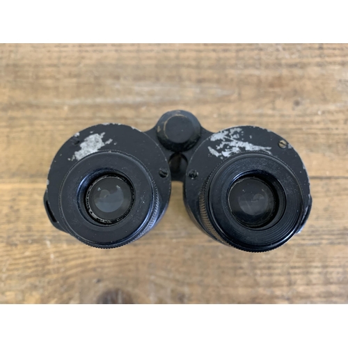 166 - A pair of unmarked WW2 German binoculars with good optics