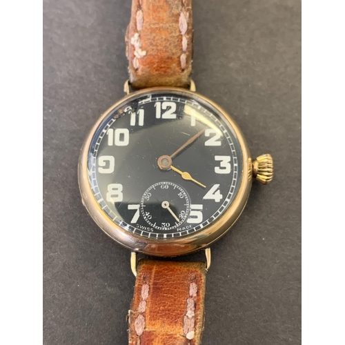 192 - A fine 9ct gold military wristwatch, clearly hallmarked on inner case for Birmingham 1918 and 'Denni... 