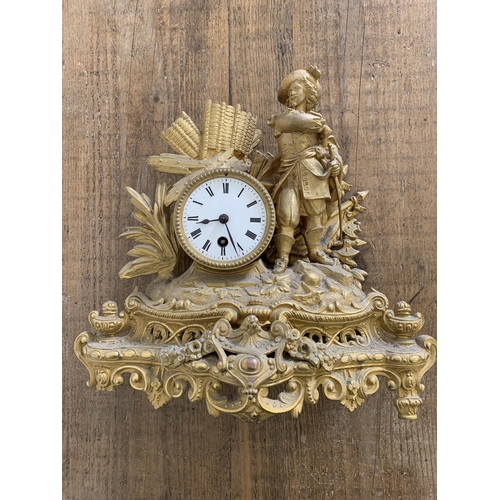 207 - Two gilded spelter mantel clocks, both approx. 11