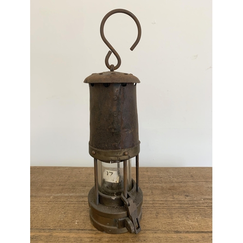 209 - An original vintage brass miners lamp with attached plaque 'E.Thomas & Williams Ltd', stamped 'VM' t... 