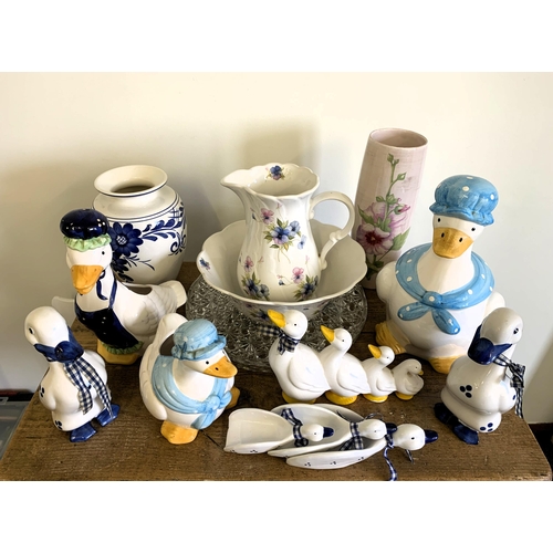 21 - A collection of ceramic duck ornaments, jug and bowl, vases etc