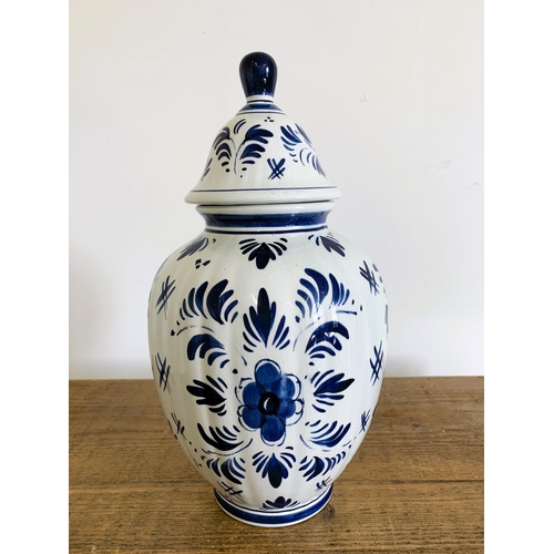 214 - A vintage Delft lidded jar, 13 1/2