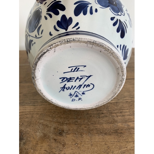 214 - A vintage Delft lidded jar, 13 1/2