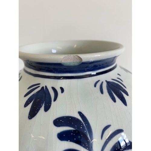 214 - A vintage Delft lidded jar, 13 1/2