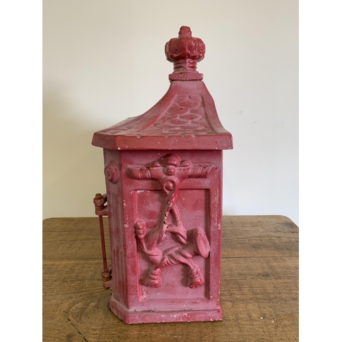 221 - A cast iron post box with key, later painted, approx. 14 1/2