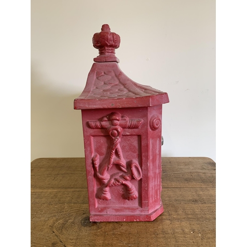 221 - A cast iron post box with key, later painted, approx. 14 1/2