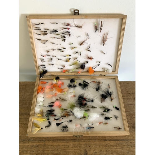 273 - A mixed lot of fishing flies, one large box 12