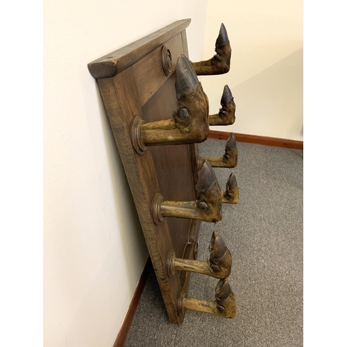 284 - A French taxidermy deer hoof gun rack, width 27