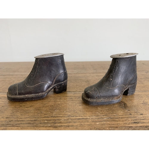 29 - A pair of antique hand made boots, leather upper and sole with pins, approx. 3 1/4