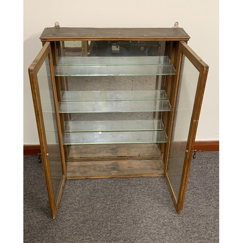 302 - An oak two door wall mounted display cabinet, three glass shelves and mirror back, 30