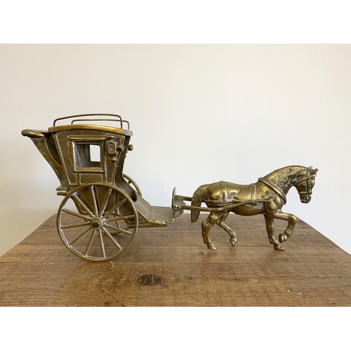 36 - A large solid and heavy brass horse and carriage, approx. 22