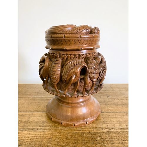 40 - A possibly Indian carved wood lidded bowl decorated with birds, approx. 9