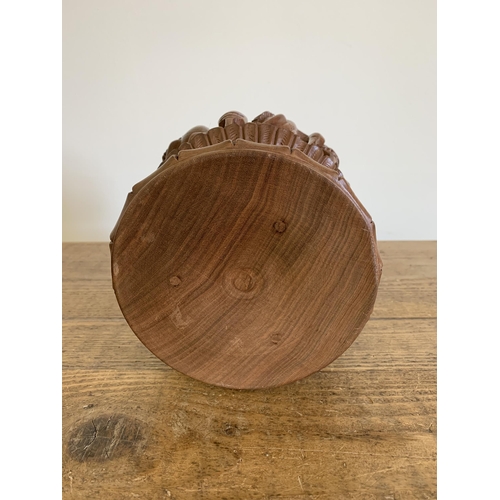 40 - A possibly Indian carved wood lidded bowl decorated with birds, approx. 9