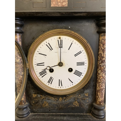 43 - An antique large slate mantel clock, key wind, inset with marble decoration, 15 1/4