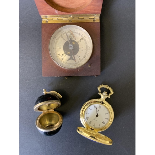 47 - A wood cased compass plus a quartz pocket watch and an apple shaped trinket pot