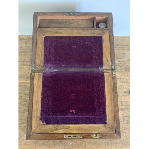 80 - A late 19th Century mahogany writing slope with velvet interior and glass ink bottle