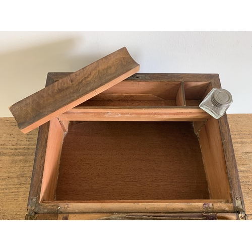 80 - A late 19th Century mahogany writing slope with velvet interior and glass ink bottle