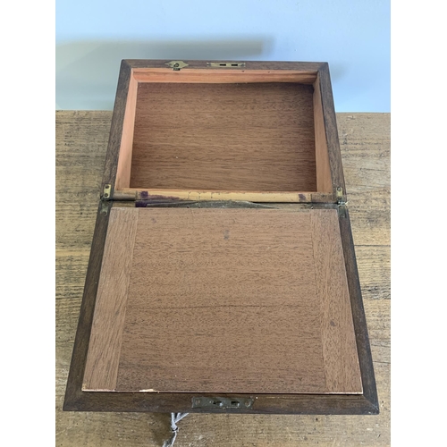 80 - A late 19th Century mahogany writing slope with velvet interior and glass ink bottle