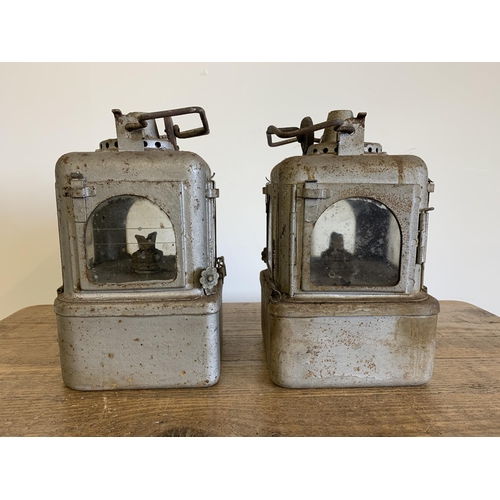 96 - A pair of vintage possibly railway lamps with later silver paint, approx. 11 1/2