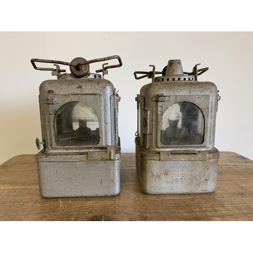 96 - A pair of vintage possibly railway lamps with later silver paint, approx. 11 1/2