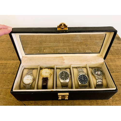 323 - Five quartz watches including Sekonda and Accurist in a costume case