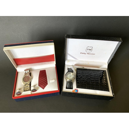 100 - A boxed Philip Mercier quartz gents watch and wallet set plus a boxed Anucci quartz watch, tie, cuff... 