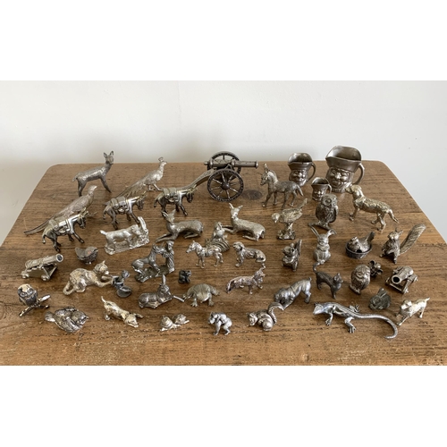 11 - A selection of white metal and pewter mainly animal figures