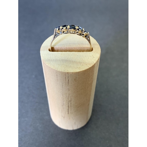 115 - A 9ct gold and sapphire set ring, approx. size P, weight approx. 1.4g