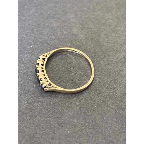 115 - A 9ct gold and sapphire set ring, approx. size P, weight approx. 1.4g