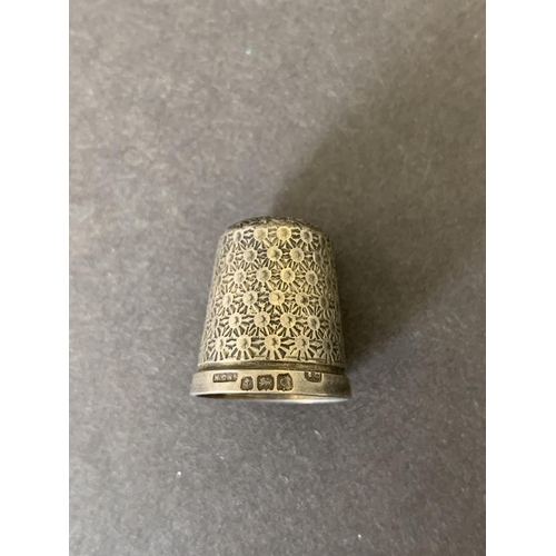 119 - A hallmarked silver thimble, an 800 grade thimble (stones missing), a white metal thimble with turqu... 