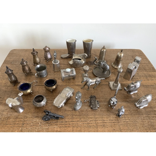 12 - Mixed metalware figures and cruets etc