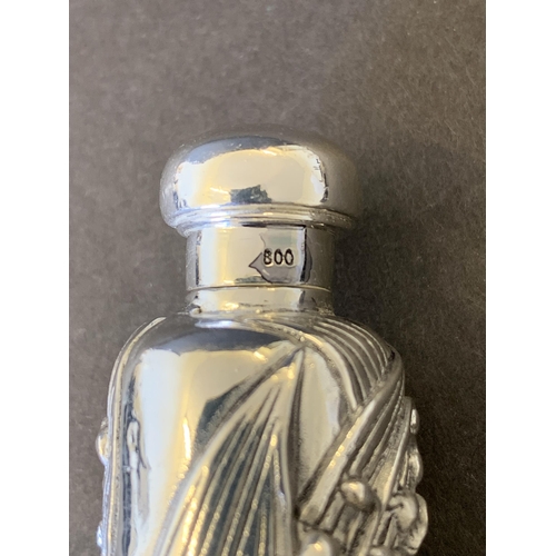 129 - An Art Nouveau style white metal scent flask, marked 800 to neck, just under 3 1/2