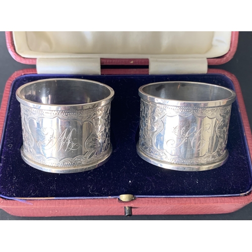 138 - A pair of cased hallmarked silver napkin rings in original box, Birmingham 1910, makers mark JR, bot... 