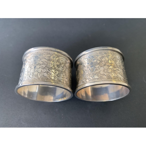 138 - A pair of cased hallmarked silver napkin rings in original box, Birmingham 1910, makers mark JR, bot... 