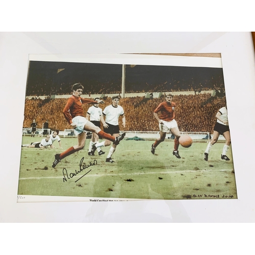 152 - A framed and glazed print of an Alan Damms picture dated 2004 of the 1996 Martin Peters world cup go... 