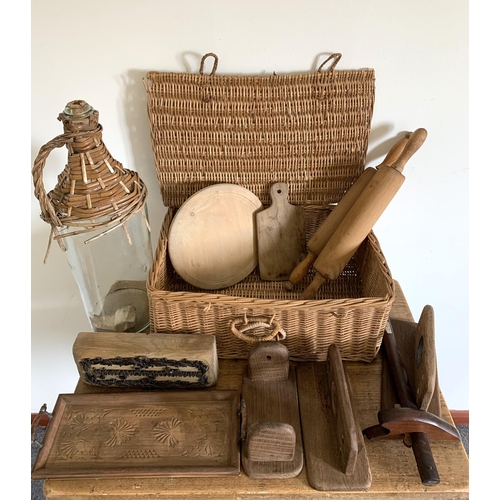 19 - A wicker basket and woodware etc contents