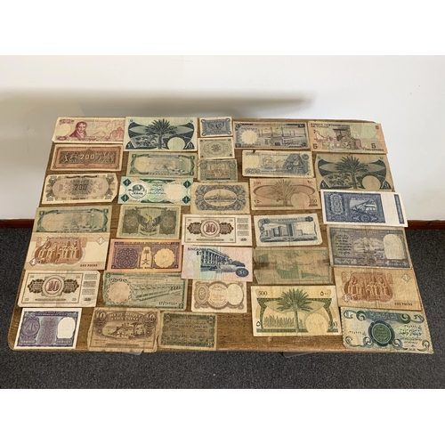 196 - Mixed vintage world banknotes, countries include Greece, South Arabia, India etc (all are in circula... 