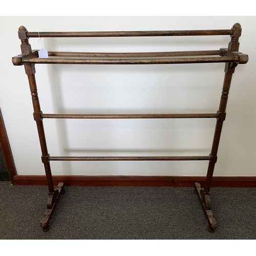 271 - A vintage stained wooden towel rail, 30