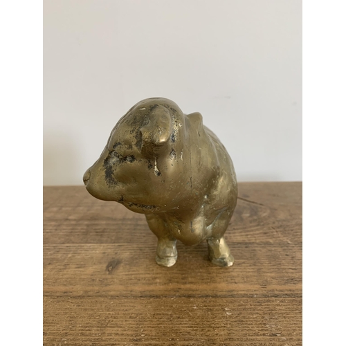 272 - A solid brass bull figurine, approx. 9 1/2