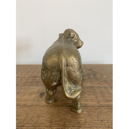 272 - A solid brass bull figurine, approx. 9 1/2