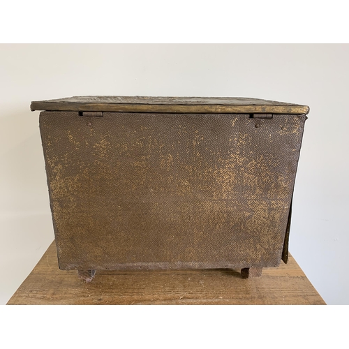 275 - A wooden carcass and brass covered vintage coal box with liner, 19 1/2