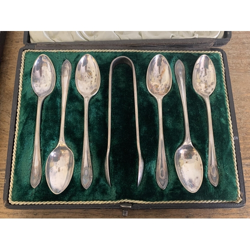 294 - Cased silver plated fish servers, a pair of plate and mother-of-pearl spoons plus a set of plated co... 