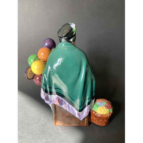 295 - A vintage Royal Doulton 'The Old Balloon Seller' HN1315 figurine, 7 1/2