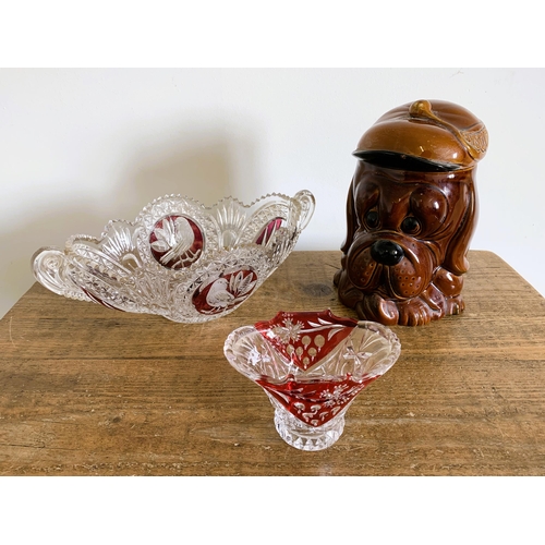 3 - A vintage 'Droopy' ceramic biscuit barrel plus a flashed cranberry cut glass dish and vase